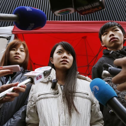 Isabella Lo (left), Prince Wong and Joshua Wong speak to the media yesterday. Photo: Reuters
