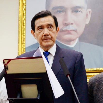 President Ma Ying-jeou (centre) has said he will resign as the Kuomintang party's chairman tomorrow. Photo: Kyodo