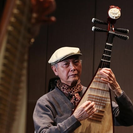 Lui Pui-yuen with his pipa. The master musician, who performs tomorrow, says that in his 80s he can offer his former hometown a sense of tranquility. Photo: Nora Tam