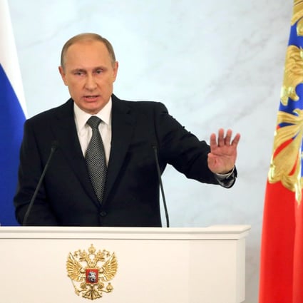Russia's President Vladimir Putin addresses the Federal Assembly. Photo: Reuters