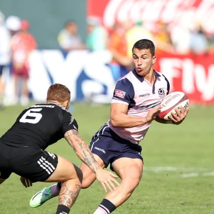 Daniel Hoyland of Scotland in action against New Zealand on the first day of the Dubai Sevens. Photo: Martin Seras Lima/World Rugby