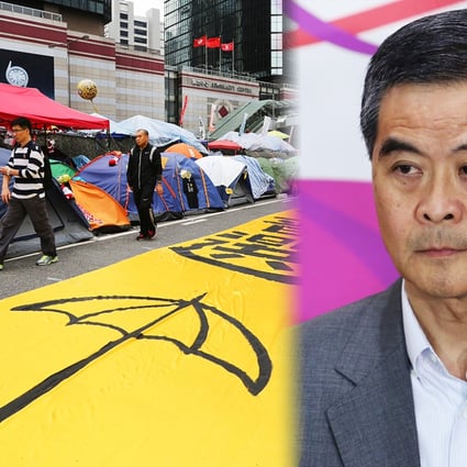An image of a yellow umbrella is spread out on the road at the site of the Admiralty Occupy protest on December 7. Leung rejected a request by students to relaunch the constitutional reform process. Photos: Sam Tsang