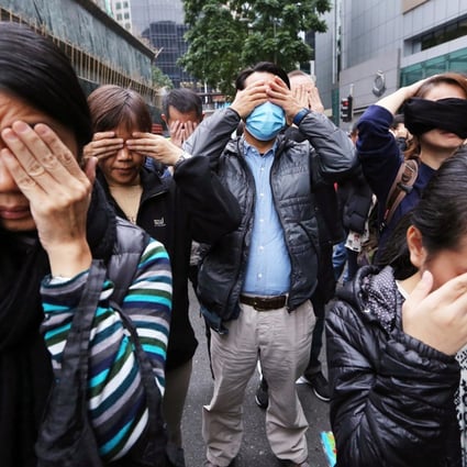 Protesters at police headquarters yesterday. Photo: Sam Tsang