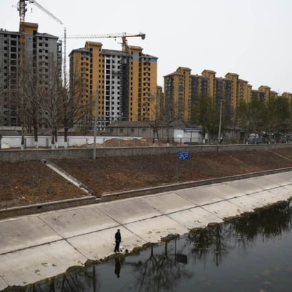 A number of regional banks had high exposure to real estate loans at a time when property prices were falling, challenging developers' ability to repay bank loans. Photo: AFP
