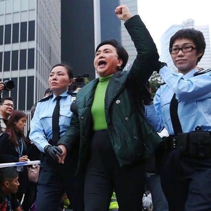 Police take away Emily Lau from Occupy's Admiralty site. Photos: Sam Tsang
