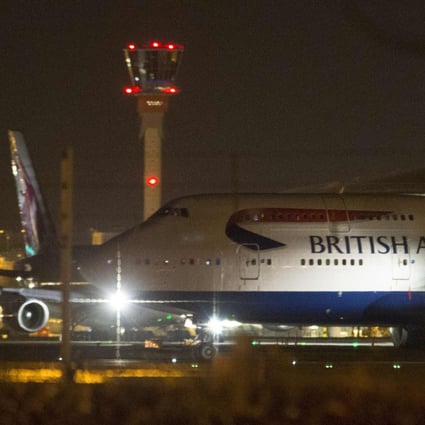 Aircraft taxi next to the control tower at Heathrow airport as flights to and from London were severely disrupted on Friday by a technical failure at England’s main air traffic control centre. Photo: Reuters
