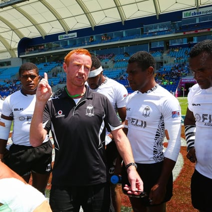 Fiji sevens coach Ben Ryan talks to his players before the start of the 2014 Gold Coast Sevens in Australia. Ryan says the loss of talented Fijians lured overseas by better wages is threatening the Pacific islanders’ preparations for the 2016 Rio Olympics. Photo: AFP