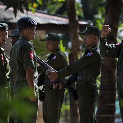 Trainees stand at attention at an army training base in Myanmar. The military accused insurgents of ambushing an army patrol and laying siege to a base last Wednesday near Kunlong, about 30km from the Chinese border. Photo: AP