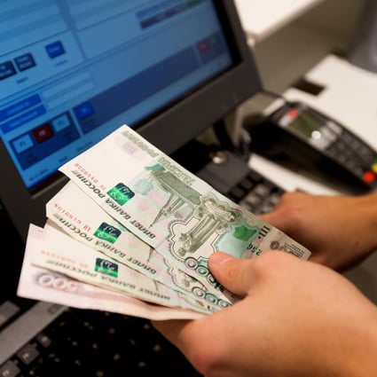 The rouble has fallen close to 20 per cent this week, taking its losses against the dollar this year to more than 50 per cent. Photo: Bloomberg