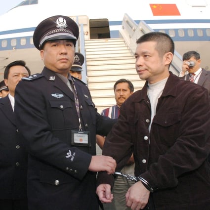 Yu Zhendong, a former Bank of China branch manager in Guangdong, embezzled about 4 billion yuan before fleeing overseas. He was repatriated in 2004 and later sentenced to 12 years in jail. Photo: AP