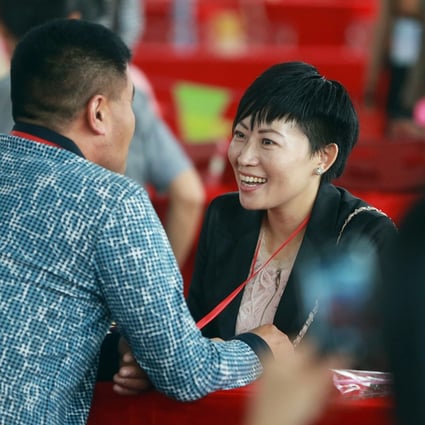 Singles attend a matchmaking event in Dongguan. Many women today seek not only a good career but also a happy family life. Photo: AFP