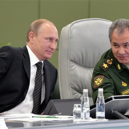 Russia's President Vladimir Putin (left) and Defence Minister Sergei Shoigu at the National Defence Control Centre of the Russian Federation in Moscow on Friday. Photo: AFP 