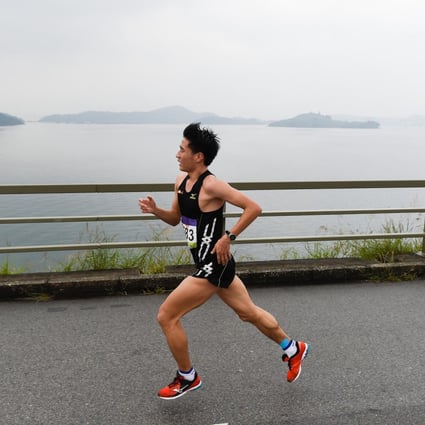 Wang Kun sets the pace at the 17km mark of the Mizuno Hong Kong Half-Marathon. Photo: Richard Castka