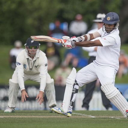 Dimuth Karunaratne hit a maiden century, going on to reach 152 in a fighting innings for Sri Lanka against New Zealand in the first test in Christchurch. Photo: AFP 