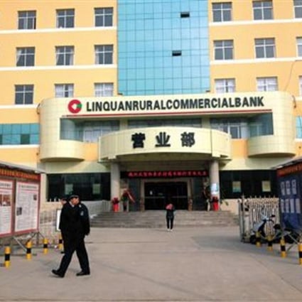 Officials in Linquan county, Anhui province want all debts repaid to the local rural cooperative before it becomes the Linquan Rural Commercial Bank. Photo: SCMP Pictures