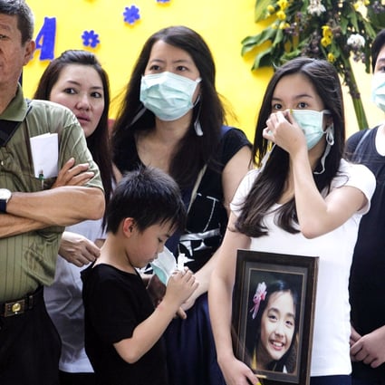 Extended family in Surabaya mourn for Meiji Thejakusama, who joked she would spend her birthday alone at sea. Photo: EPA