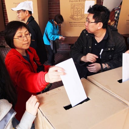 People vote at a polling station in Hong Kong Polytechnic University in Hung Hom in the mock Chief Executive election. Photo: Dickson Lee