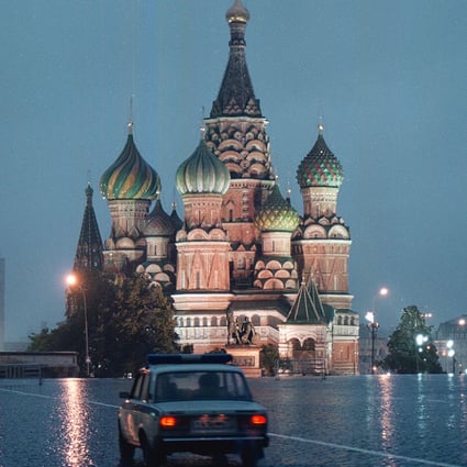 A car passes through Moscow's Red Square past St Basil's cathedral. Photo: AP