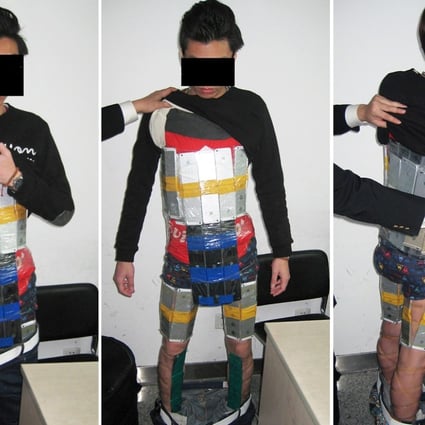 The alleged Hong Kong smuggler was found with the 94 iPhone 6 and iPhone 5s models strapped to his thighs, chest and stomach. Photo: Shenzhen Customs