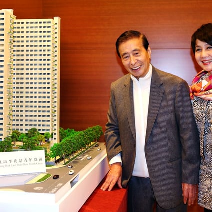 Lee Shau-kee and Angela Leong On-kei, the chairman of Po Leung Kuk, with a model of the hostel. Photo: Nora Tam