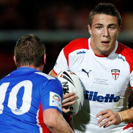 Sam Burgess braces for impact during a Four Nations rugby league match between England and France. The code-swapping centre may now see his bid for a place in England’s rugby union squad boosted by the midfield injury crisis. Photo: AP
