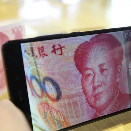 A 100-yuan note bearing the picture of Mao Zedong is seen. The yuan is now the world's 5th biggest payment currency. Photo: Simon Song