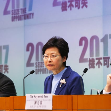 (Left to right) Secretary for Justice Rimsky Yuen Kwok-keung, Chief Secretary Carrie Lam Cheng Yuet-ngor and Secretary for Constitutional and Mainland Affairs Raymond Tam Chi-yuen attend a press conference to promote the government's controversial second round of public consultation on the method for selecting the Chief Executive of Hong Kong by universal suffrage. Photo: David Wong