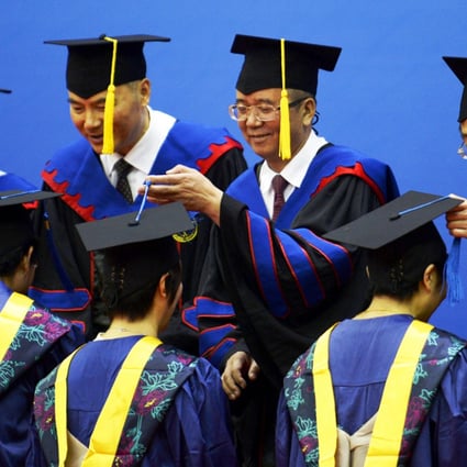 Educators turn the tassels for graduates at Zhejiang University. Chinese universities have been told to stop using books that inculcate Western ideology. Photo: Xinhua