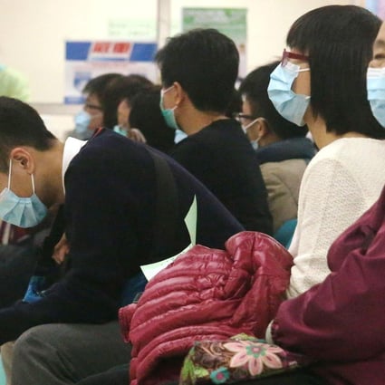 Patients reporting fevers wait to be seen at a Hong Kong hospital.