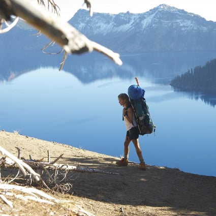 Reese Witherspoon as hiker Cheryl Strayed, with her giant rucksack.