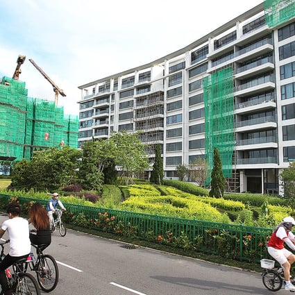 Luxury housing estates under construction in Tai Po. Hong Kong as property stocks were hit as the government warns against a housing bubble in the sector. Photo: Dickson Lee