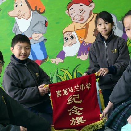 Pupils (from left) Mary Cheung Yee-ki, Savio Law Siu-hei, Komi Kwong Chi-shan and Michelle Lee Wing-chun talk about mainland exchanges at Lion Clubs International Ho Tak Sum Primary School. Photo: K. Y. Cheng