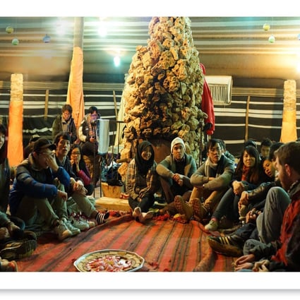 Hong Kong students visit a Bedouin camp during last month's tour of Israel.