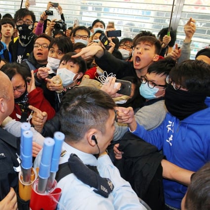 Protesters clash with police officers during a rally against parallel trading in Tuen Mun. Photo: Dickson Lee