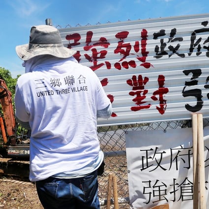 Villagers of San Heung (a community of villages consisting Pak Mong, Ngau Kwu Long and Tai Ho) protest against a plan to draw a Site of Special Scientific Interest in the country park enclave of Tai Ho, North Lantau Island, by chopping down trees in the forest. Photo: David Wong