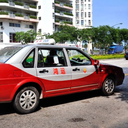 A taxi on the streets of Shenzhen. The city's government is reviewing the fees drivers pay to cab companies, according to a newspaper report. Photo: SCMP Pictures