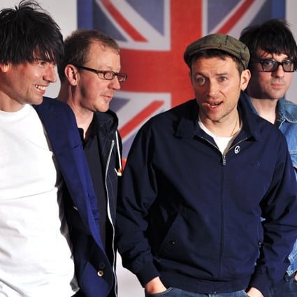 Graham Coxon, right, pictured with band mates bassist Alex James, left, drummer Dave Rowntree and singer Damon Albarn, said Hong Kong has made its way into Blur's music. Photo: AFP