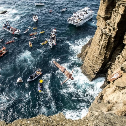 Professional diver David Colturi dives off a high cliff. Photos: Red Bull Media House; Thinkstock