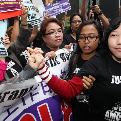 Erwiana meets her supporters outside Wan Chai District Court following the sentencing of her former employer Law Wan-tung. Photo: Dickson Lee