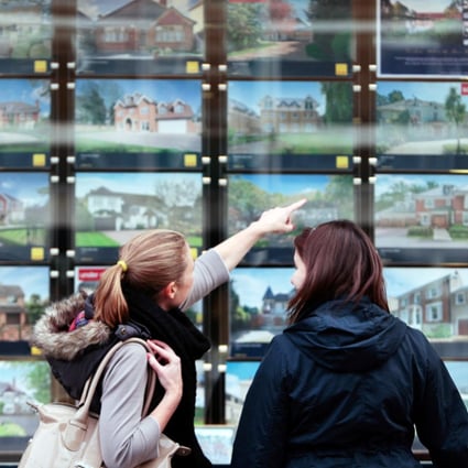 While mortgage rates in Britain are at record lows, a lack of supply and high demand have pushed up house prices. Photo: Bloomberg