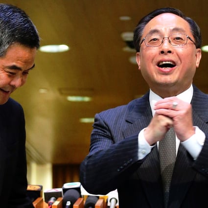 Nicholas Yang and CY Leung speak to the press at Central Government Offices in Tamar. Yang is the former executive vice-president of the Polytechnic University. Photo: David Wong