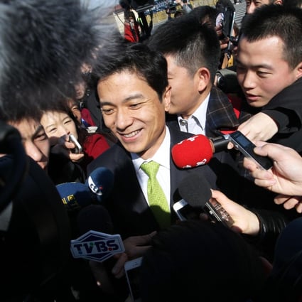 Baidu founder Robin Li Yanhong speaks to reporters at the Great Hall of the People about his plans to develop artificial intelligence. Photo: Simon Song