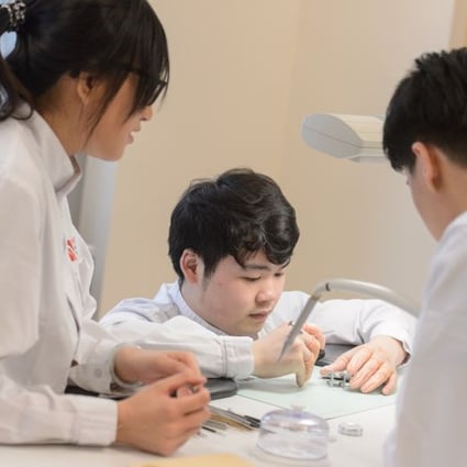 Students gain insights into the intricacies of watchmaking at Hong Kong Institute of Swiss Watchmaking.