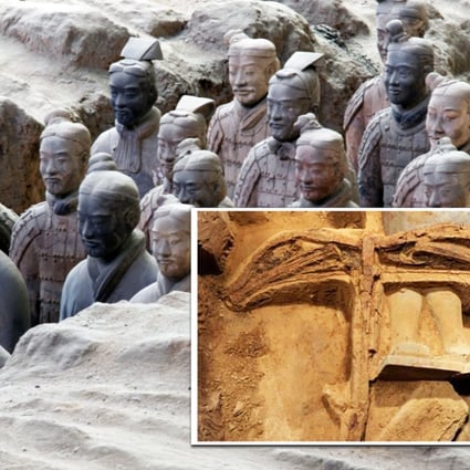The well preserved crossbow remains half buried in the ground beside a terracotta warrior. Photos: SCMP Pictures, AFP