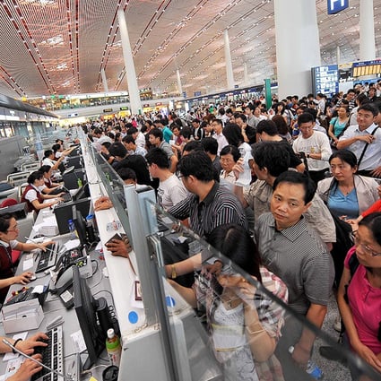 Huge check-in queues at Beijing Capital International Airport. Photo: Xinhua