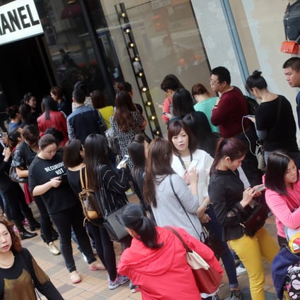 Shoppers and tourists flocked to Chanel stores in Hong Kong last Friday as the luxury brand slashed prices of its classic bags by almost 20 per cent. Photo: David Wong