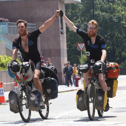 Britons Nick Codrington, 24, and Laurence Gribble, 23, make it to The Peak yesterday. Photo: David Wong