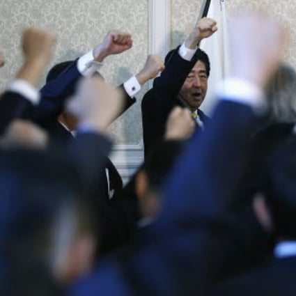 Japan, under Prime Minister Shinzo Abe, has gone hell for leather to create 2 per cent inflation. Photo: Reuters