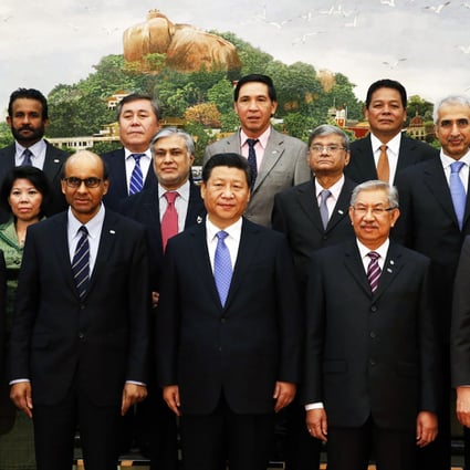 President Xi Jinping (centre) with other leaders at the launch ceremony of the Asian Infrastructure Investment Bank last October in Beijing. Photo: Reuters