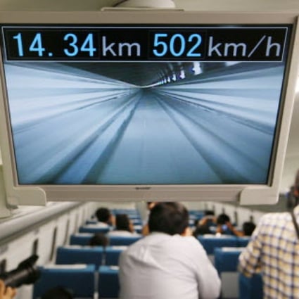 A screen monitor inside Central Japan Railway Co.'s L0 series maglev train shows the train is running at a speed of over 500 km/h during a test-ride. Photo: Kyodo